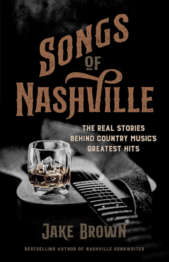 Cover of Songs of Nashville by Jake Brown – A glass of whiskey rests on a guitar, with rustic lettering and a moody black-and-white tone